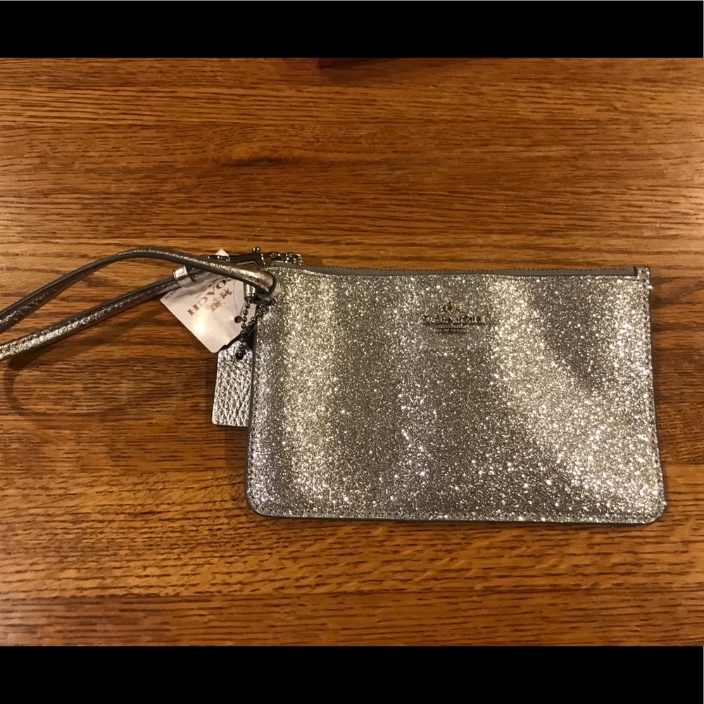Brand new silver Coach wristlet
